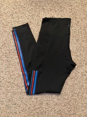 Champion C9 black leggings with blue and red stripes, phone pockets